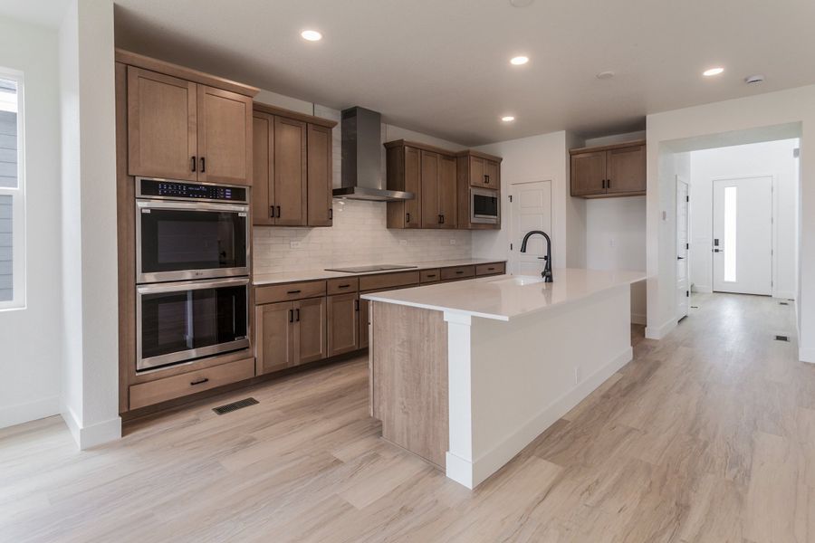 Furnished interior view inside a new home in Prairie Song, Windsor (Image 8).