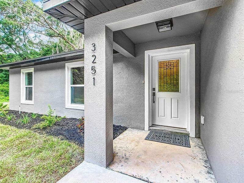 Exterior details and patio area of a home in , Williston (Image 2). Exterior details and patio area of a home in , Williston (Image 2).