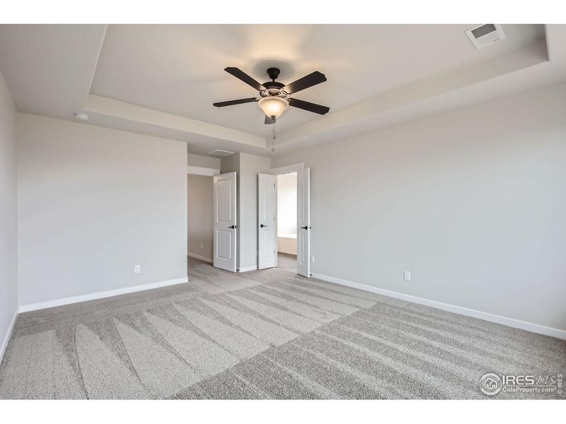 Spacious, unfurnished interior of a new home in RainDance, Windsor (Image 23).