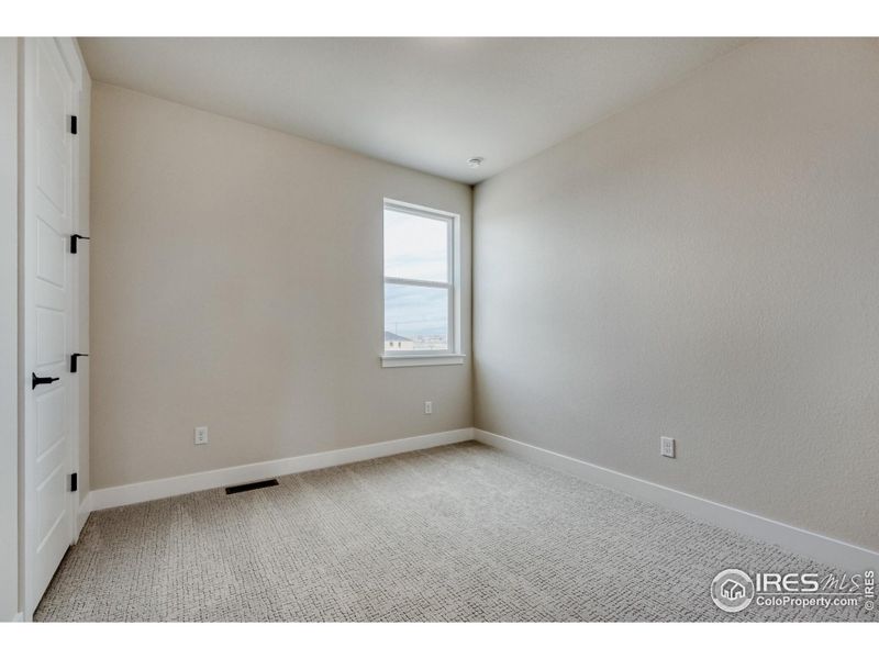 Spacious, unfurnished interior of a new home in Barefoot Lakes, Firestone (Image 26).