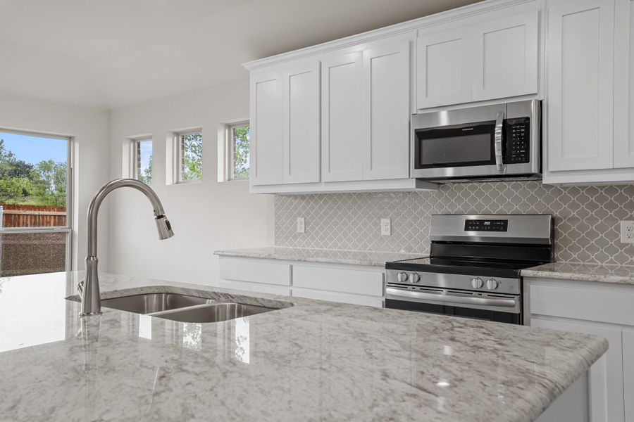 Representative furnished interior of a home built from the Waterford III by Cheldan Homes in Stoneview, Glen Rose (Image 6).