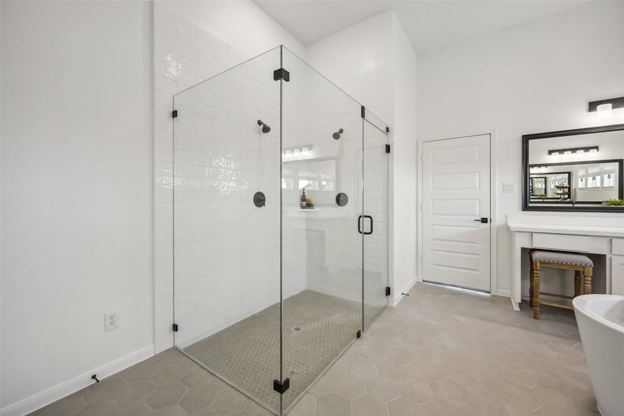 Large shower in the primary bath (*Photo not of actual home and used for illustration purposes only.) Large shower in the primary bath (*Photo not of actual home and used for illustration purposes only.)