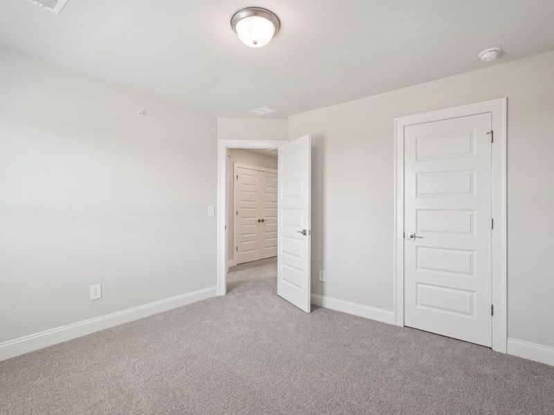 Spacious, unfurnished interior of a new home in Martin Springs - Highland Series, Lawrenceville (Image 19).