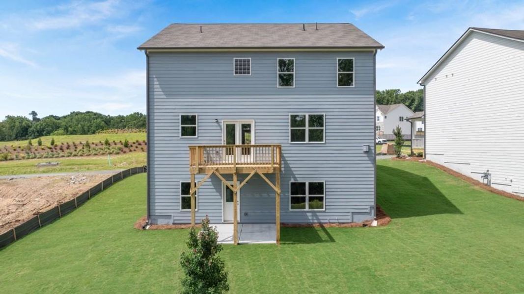 Exterior details and patio area of a home in Liberty Crossing, Braselton (Image 3).
