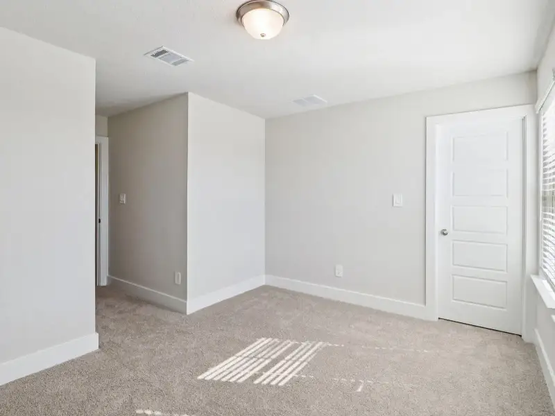 Spacious, unfurnished interior of a new home in Legendary Trails - Premier Series, Cibolo (Image 25).