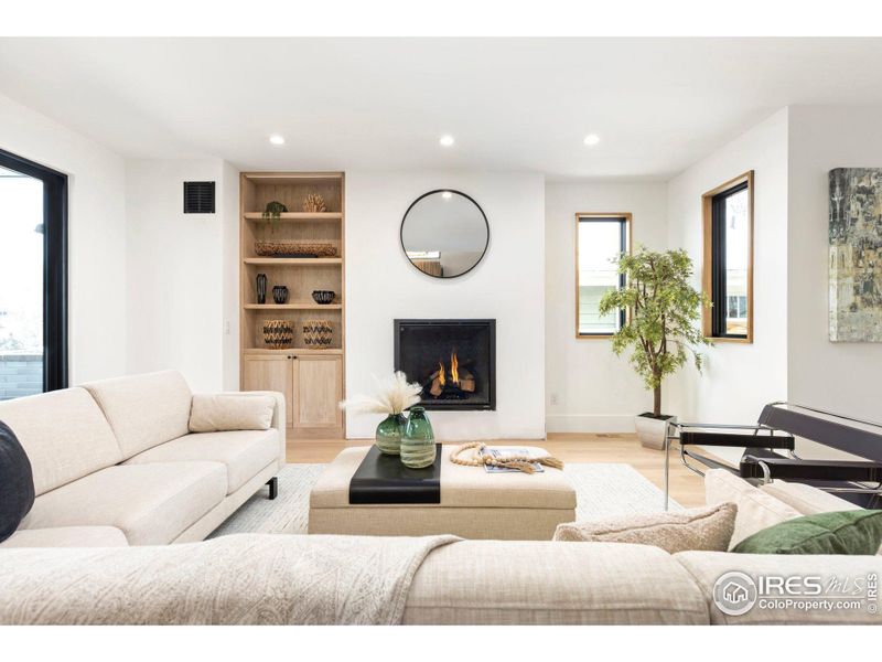 Beautiful finishes in an open floor plan. Fireplace surround to be installed first week of March.