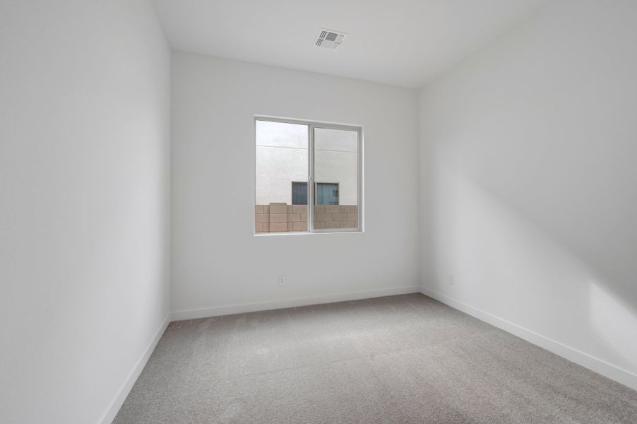 Spacious, unfurnished interior of a new home in Soleo, San Tan Valley (Image 30).