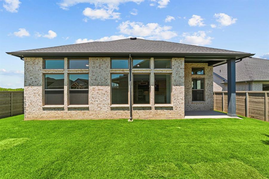 Front exterior of a new home in Treeline, Justin, TX, highlighting curb appeal (Image 19).