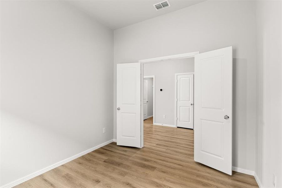Spacious, unfurnished interior of a new home in Verandah, Royse City (Image 23).