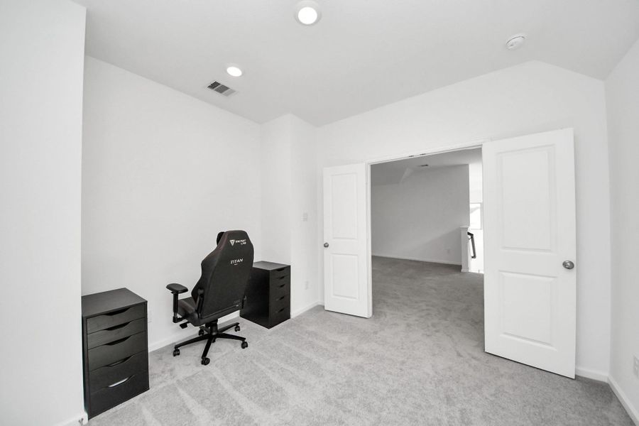 Furnished interior view inside a new home in The Trails, New Caney (Image 10).