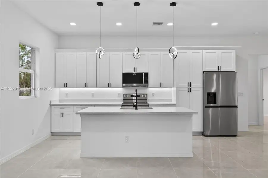 Furnished interior view inside a new home in , Lehigh Acres (Image 5).