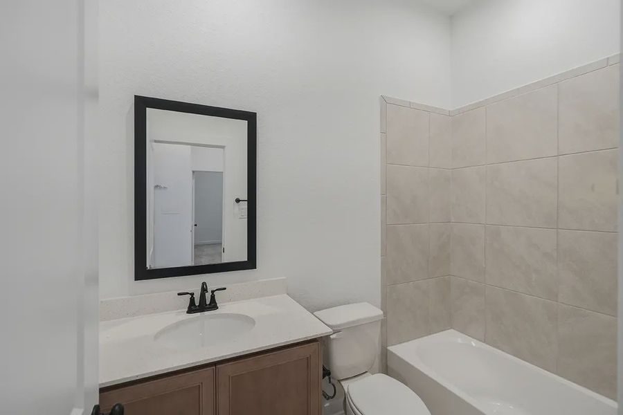Furnished interior view inside a new home in The Crossvine, Schertz (Image 13).