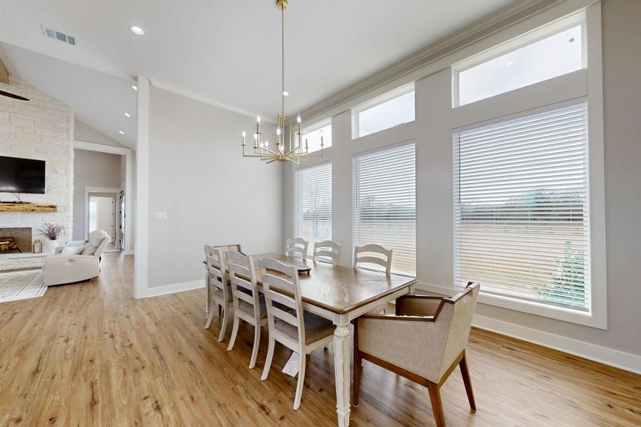 Living, Dining, and entertaining in your exquisit kitchen with huge island. Work, play, relax and enjoy the beautiful land outside from the comfort of your home. What a gorgeous view!  You did say you wanted a house with a lot of nautral light, Right?