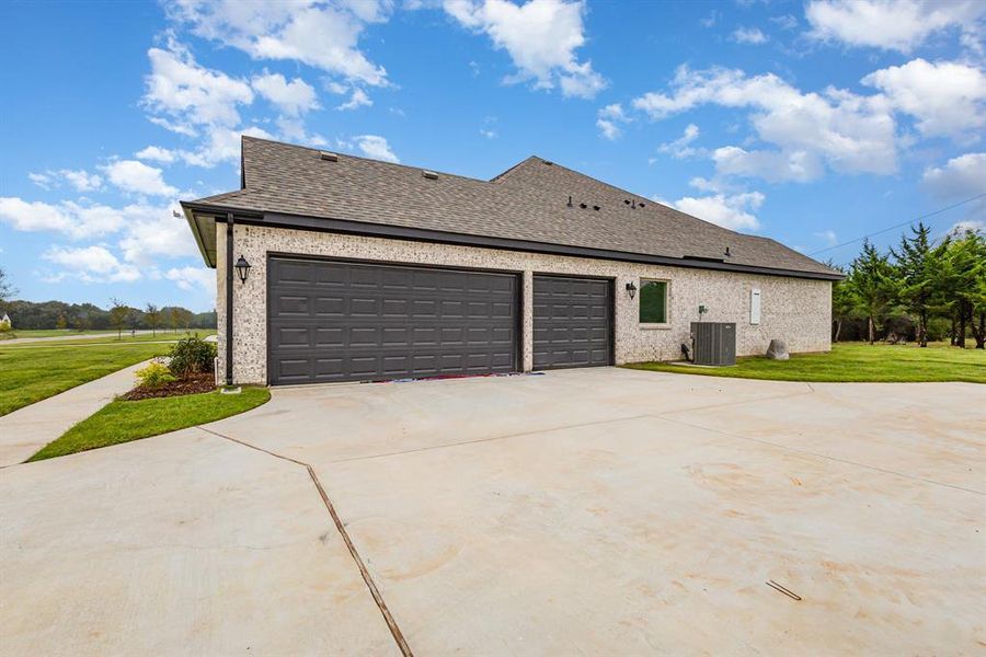 Front exterior of a new home in Sagebrush Addition, Midlothian, TX, highlighting curb appeal (Image 22).