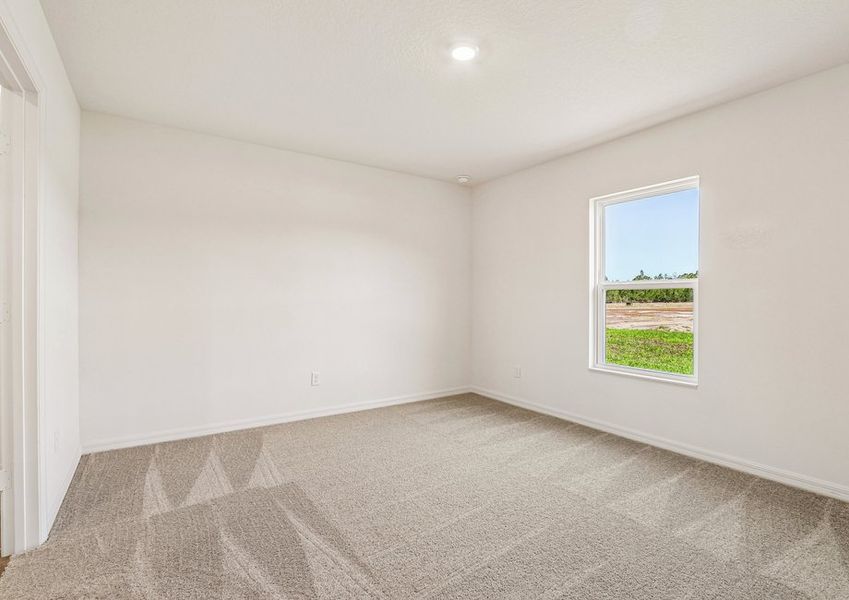 Rest and relaxation await in the master bedroom