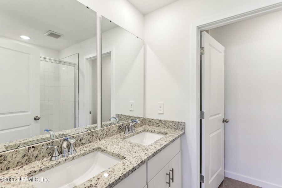 Furnished interior view inside a new home in Flagler Village - Classic Series, Palm Coast (Image 12).