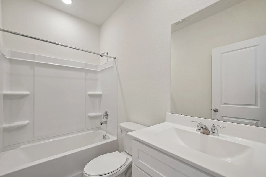 Representative furnished interior of a home built from the Odyssey by Starlight Homes in Oakfield Lakes, Parrish (Image 10).