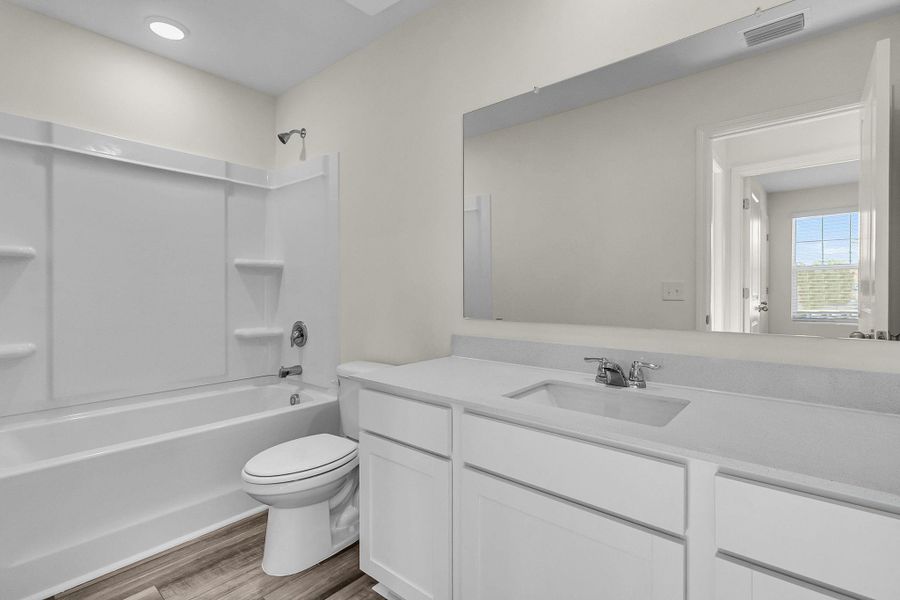 Furnished interior view inside a new home in Castlewood South, Taylor (Image 6).