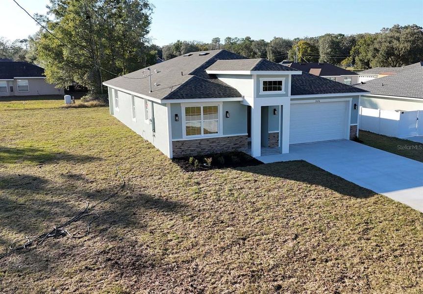 Exterior details and patio area of a home in , Summerfield (Image 31).
