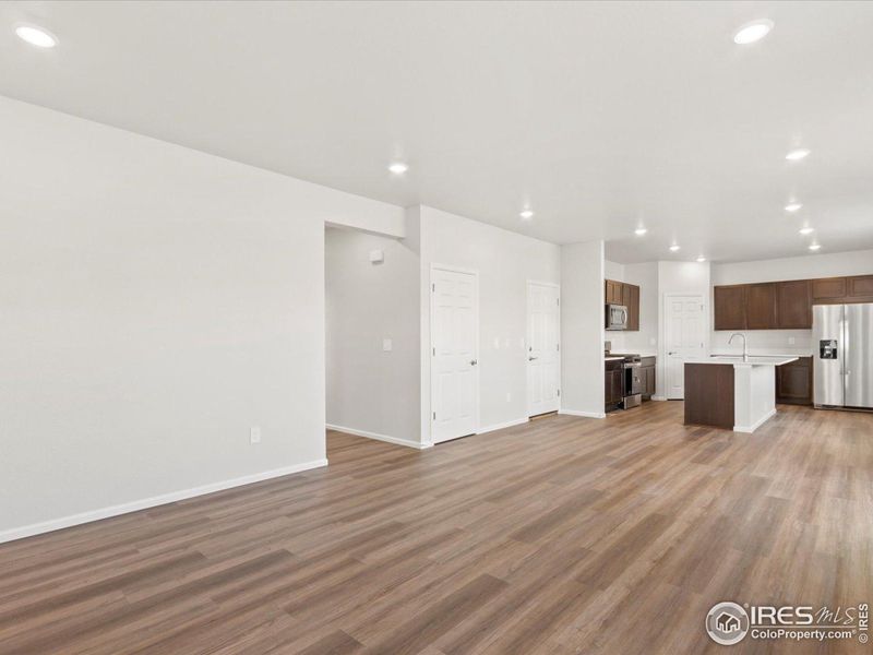 Great room looking to the kitchen