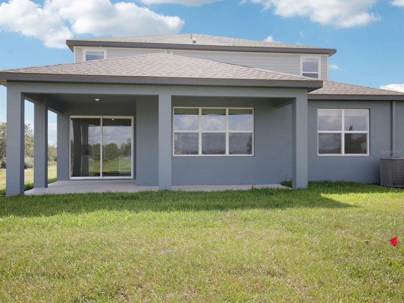 Exterior details and patio area of a home in Coasterra - Reserve Series, Palmetto (Image 27).