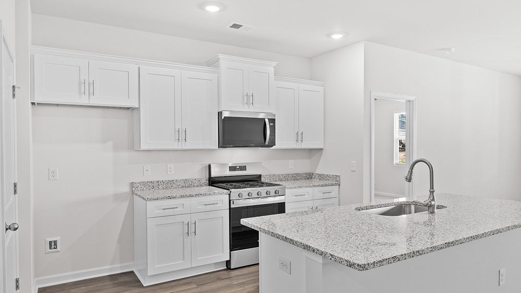 Furnished interior view inside a new home in Highland Hills, Graniteville (Image 4).