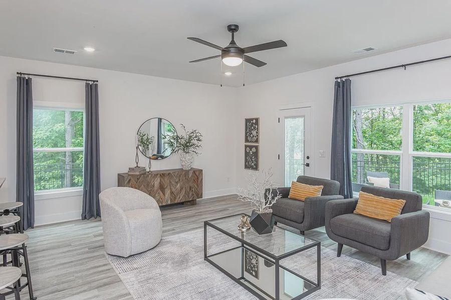 Representative furnished interior of a home built from the 1557 Townhome by Adams Homes in Parkstone Place Townhomes, Roebuck (Image 9).