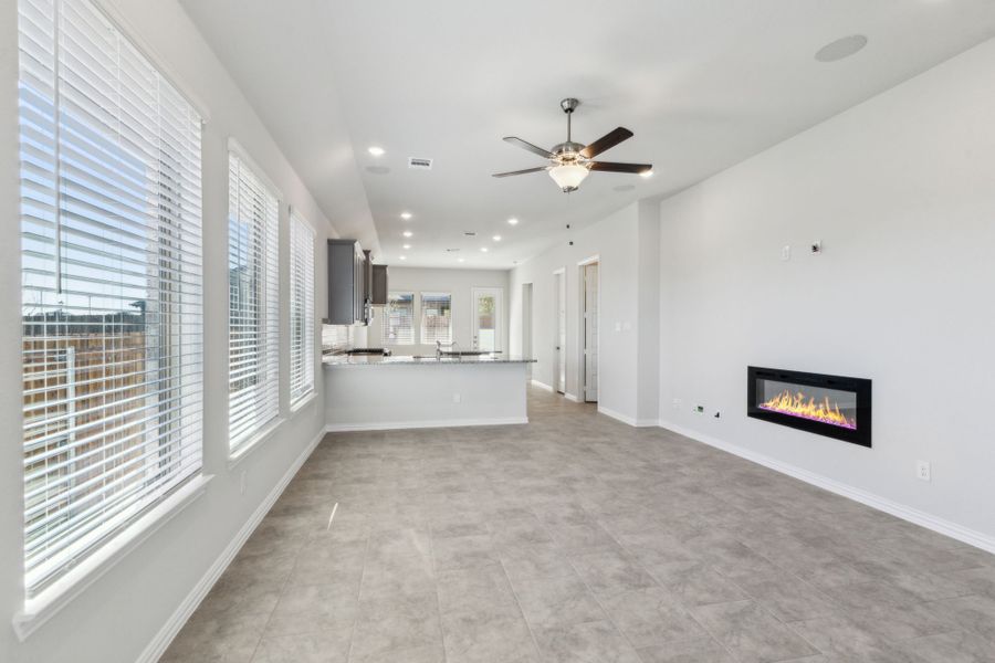 Representative unfurnished interior of a home built from the Tucson by Chesmar Homes in Avondale, Fate (Image 7).