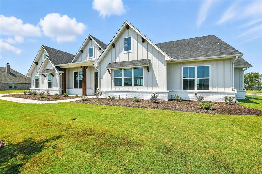 Front exterior of a new home in Rocky Top Ranch, Reno, TX, highlighting curb appeal (Image 18). Front exterior of a new home in Rocky Top Ranch, Reno, TX, highlighting curb appeal (Image 18).