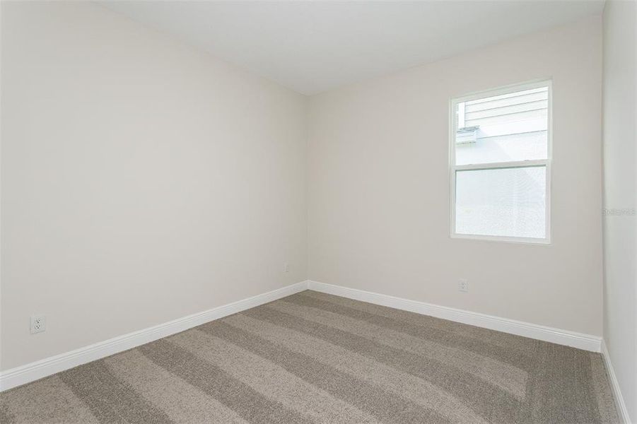 Spacious, unfurnished interior of a new home in Pasadena Woods, Dade City (Image 18).