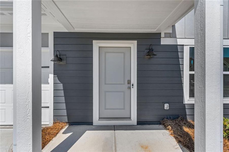Exterior details and patio area of a home in Twin Lakes, Hoschton (Image 32).