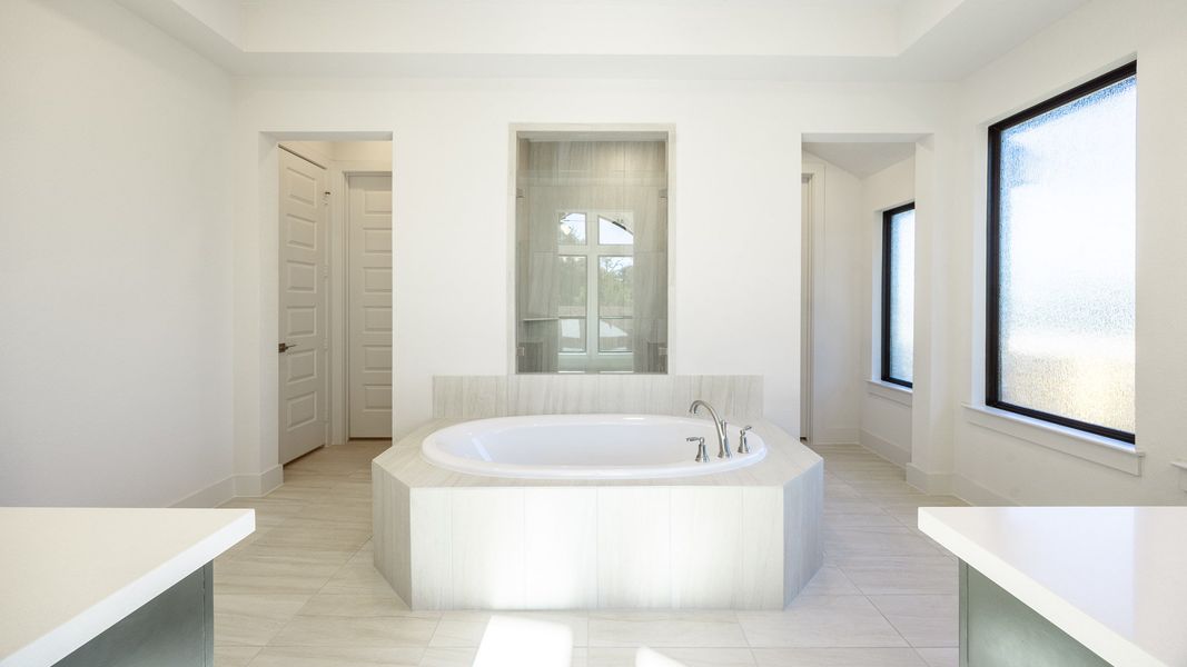 Furnished interior view inside a new home in Parkside On The River 60', Georgetown (Image 7).