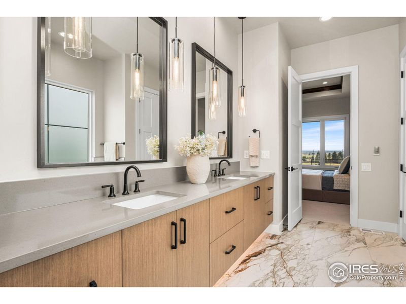 Luxurious primary bath with heated floors