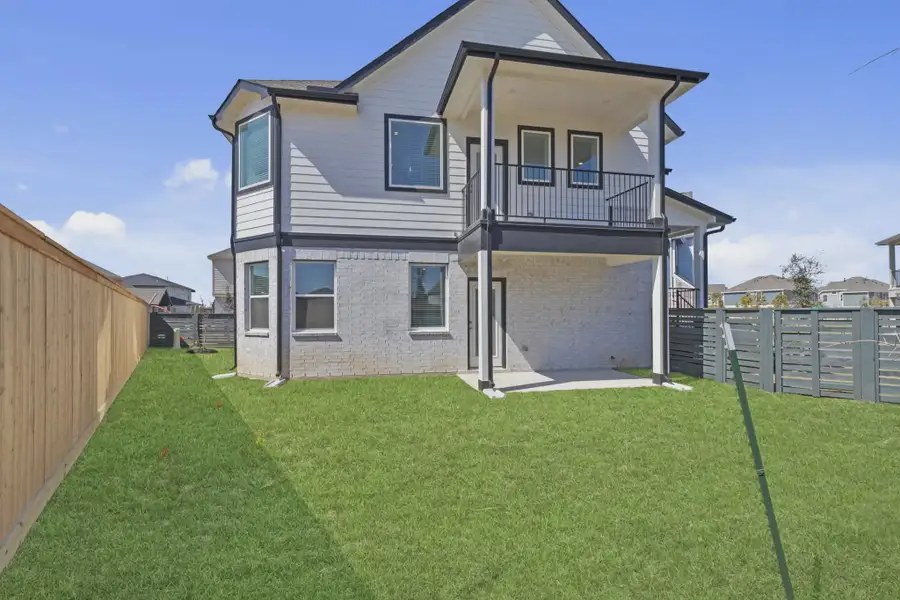 Representative exterior details of a home built from the Oakdale by Chesmar Homes in Bridgeland, Elgin (Image 4).
