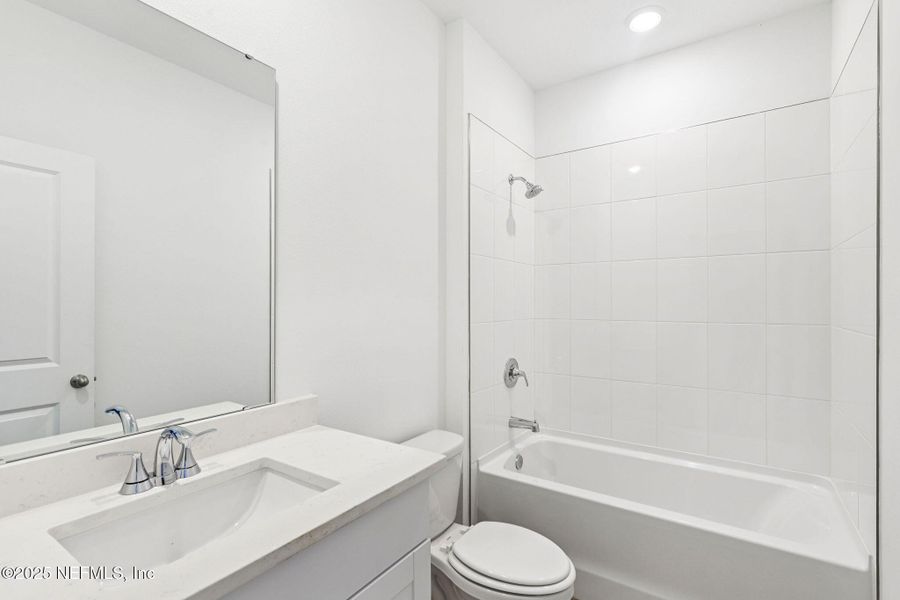 Furnished interior view inside a new home in Lakes at Bella Lago - Signature Series, Green Cove Springs (Image 7).