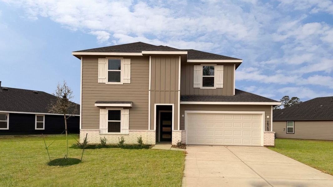 Representative exterior photo of a completed home built from the Rosemont by D.R. Horton in Chapel Lakes, Montgomery, TX (Image 2). Representative exterior photo of a completed home built from the Rosemont by D.R. Horton in Chapel Lakes, Montgomery, TX (Image 2).