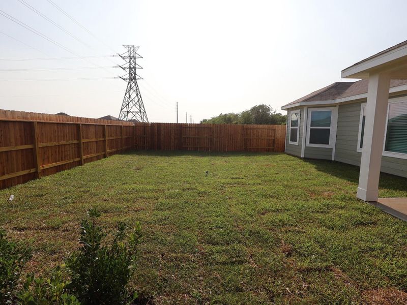 Exterior details and patio area of a home in Ambrose, La Marque (Image 23).
