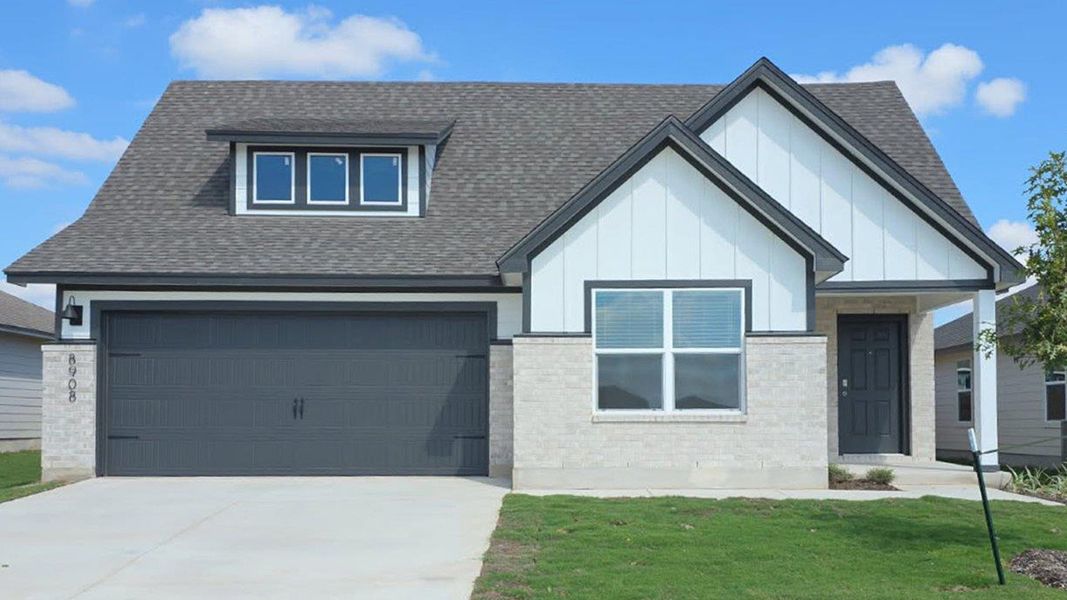 Front exterior of a new home in Mesa Ridge, Temple, TX, highlighting curb appeal (Image 1).