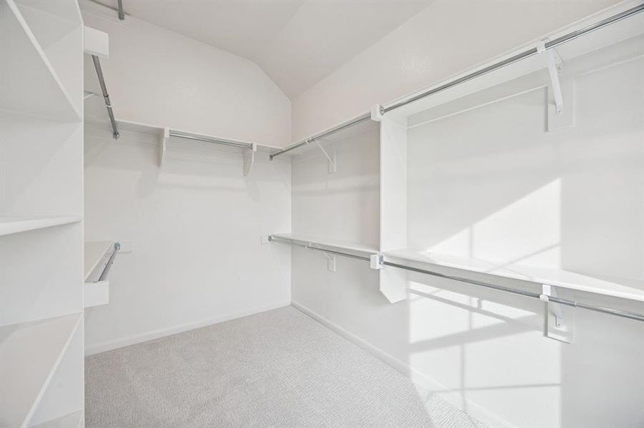 With seasonal hanging space, natural light and plenty of storage room, your dream owner's closet awaits!