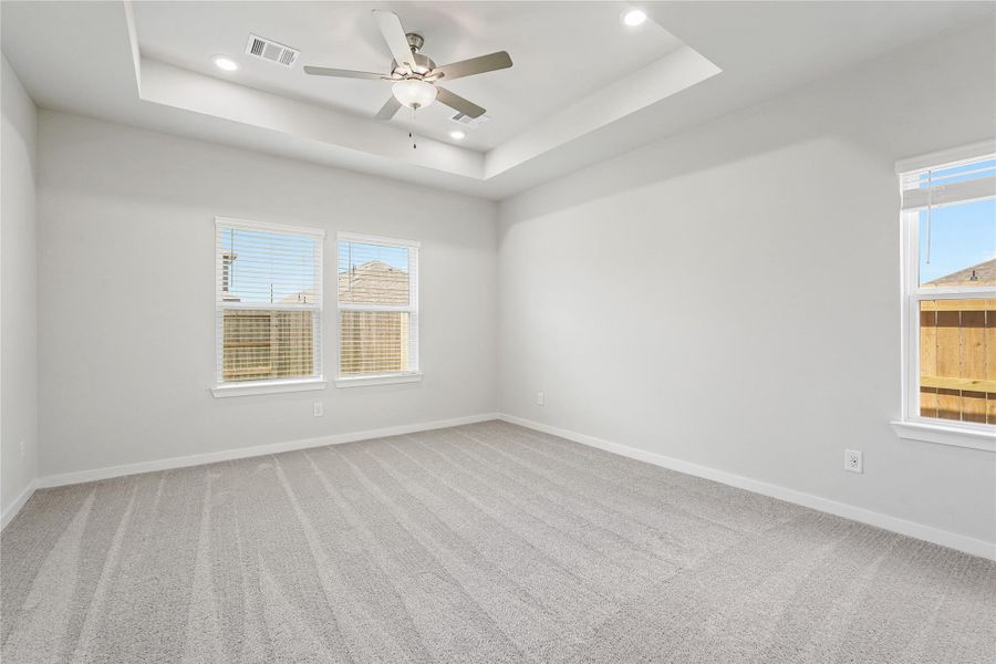 Spacious, unfurnished interior of a new home in Sunterra, Katy (Image 17).