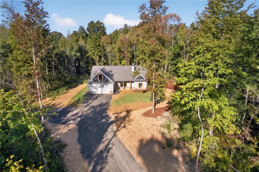 Front exterior of a new home in , Silver Creek, GA, highlighting curb appeal (Image 25). Front exterior of a new home in , Silver Creek, GA, highlighting curb appeal (Image 25).