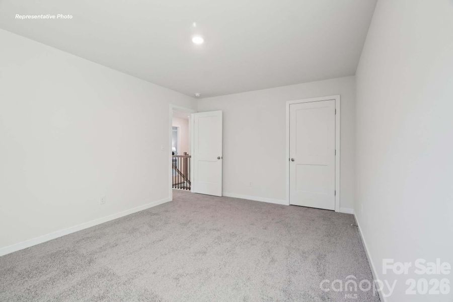 Spacious, unfurnished interior of a new home in Sanctuary at Southgate, Indian Trail (Image 30).