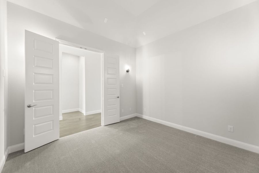 Representative unfurnished interior of a home built from the Jordan by Windsor Homes in Nelson Lake Estates, Rockwall (Image 19).