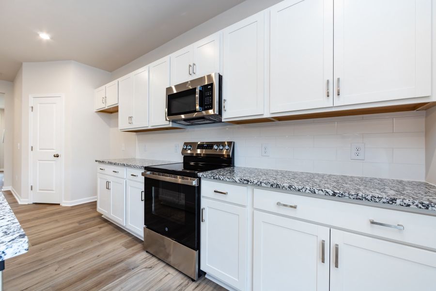 Furnished interior view inside a new home in Fifteen 15 Cannon, Charlotte (Image 11).