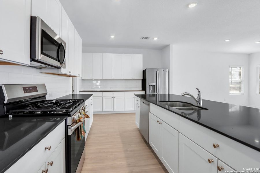 Furnished interior view inside a new home in Navarro Ranch: Classic Collection, Seguin (Image 9).