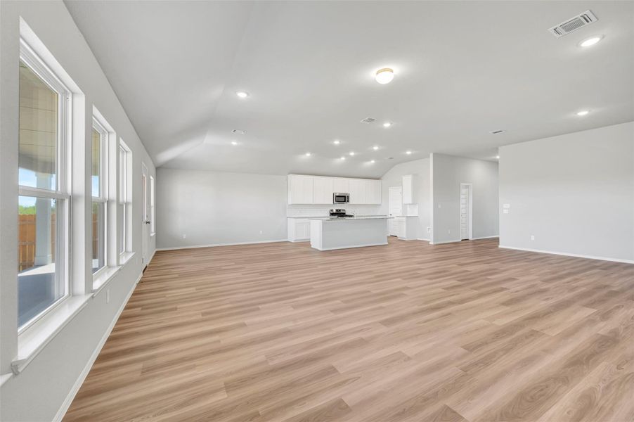Spacious, unfurnished interior of a new home in Carillon, Manor (Image 31).