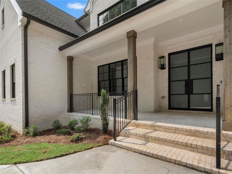 Front exterior of a new home in , Atlanta, GA, highlighting curb appeal (Image 24).