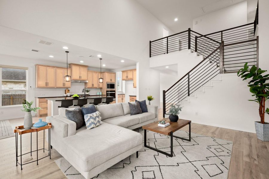 Enjoy seamless connectivity throughout with the living room flowing into the kitchen and dining area and the second floor opening to the main level. Enjoy seamless connectivity throughout with the living room flowing into the kitchen and dining area and the second floor opening to the main level.