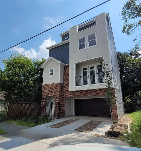 Front exterior of a new home in , Houston, TX, highlighting curb appeal (Image 1). Front exterior of a new home in , Houston, TX, highlighting curb appeal (Image 1).