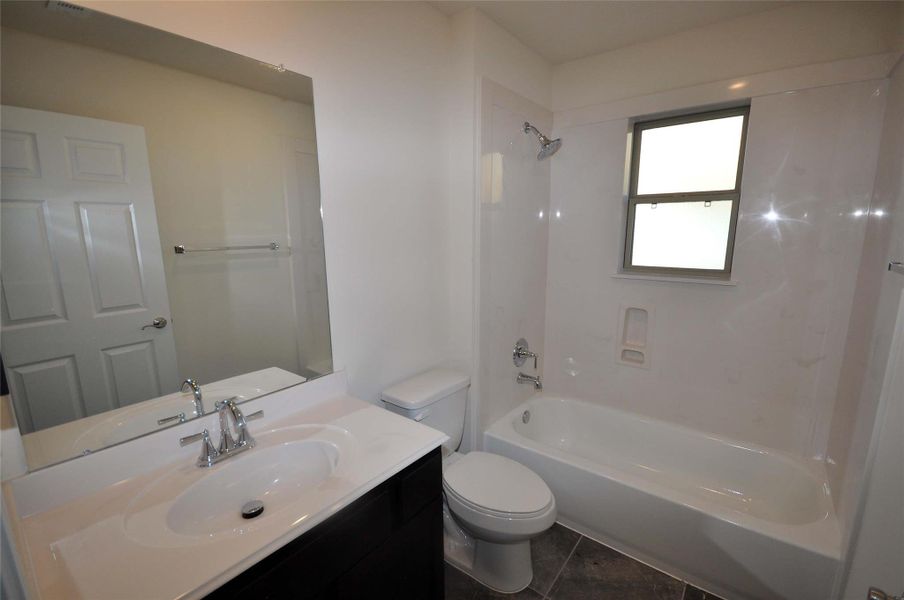 Furnished interior view inside a new home in Pedregal, League City (Image 12).